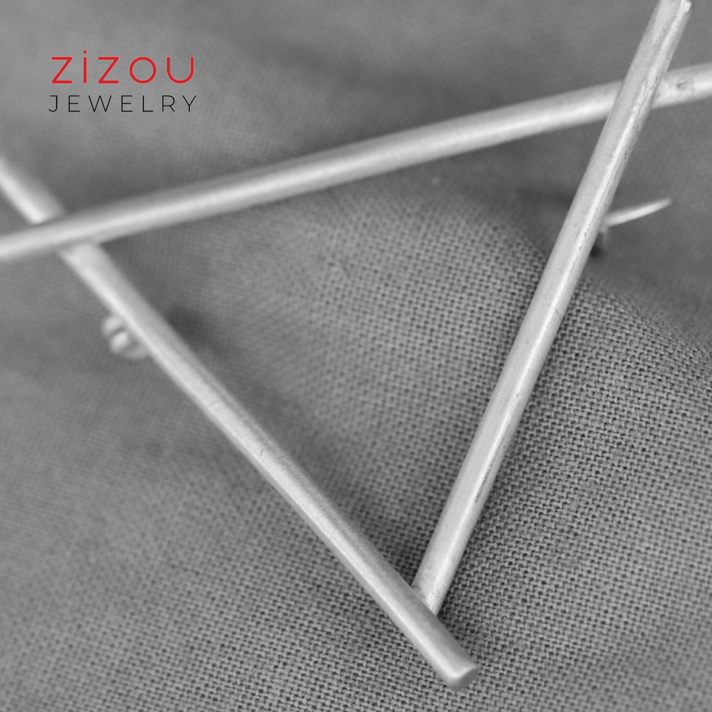 Triangle brooch