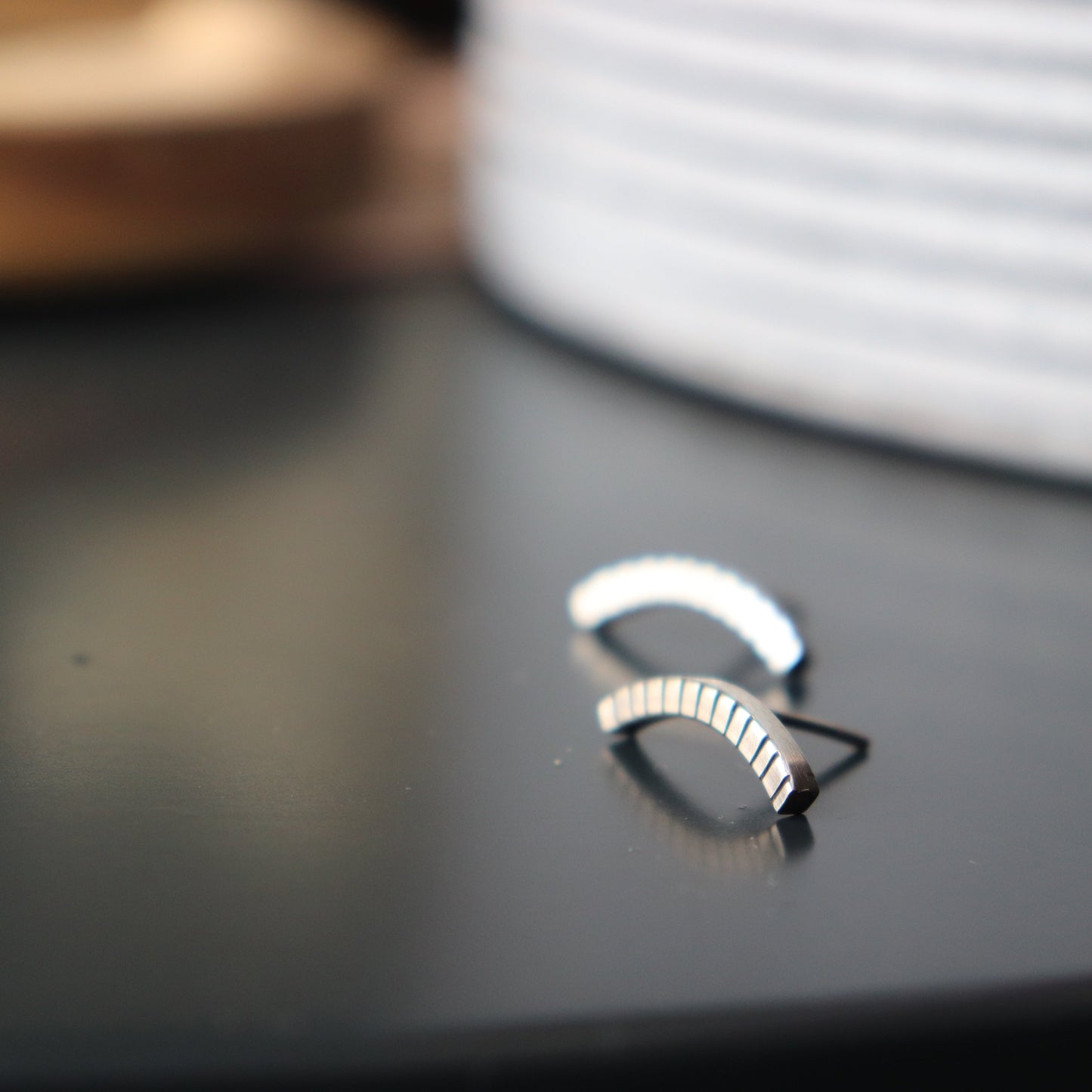 Handcrafted minimalist silver stud earrings from the "Nothing, Really" collection. Made from recycled silver with clean lines and a high-shine finish. Ships from Croatia.