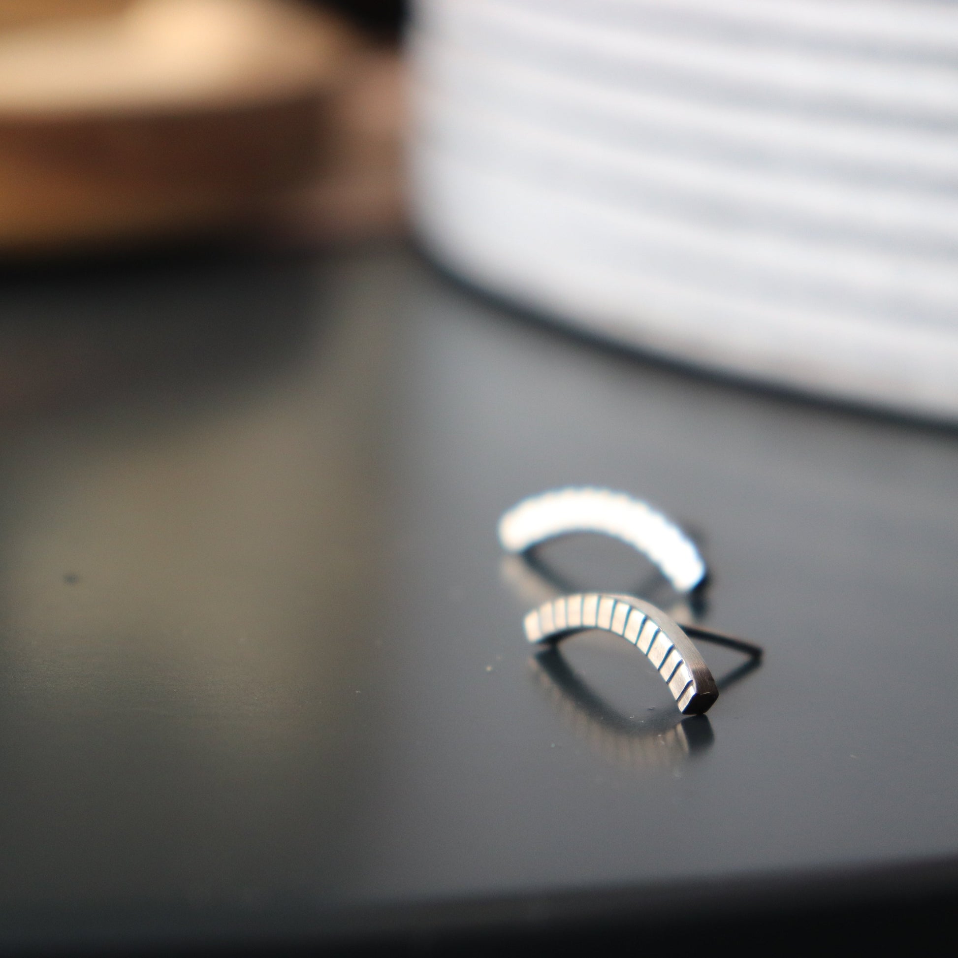 Handcrafted minimalist silver stud earrings from the "Nothing, Really" collection. Made from recycled silver with clean lines and a high-shine finish. Ships from Croatia.