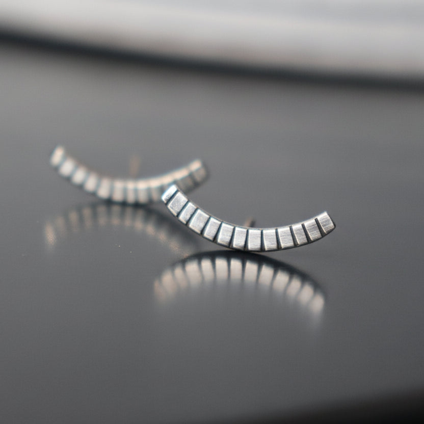 Handcrafted minimalist silver stud earrings from the "Nothing, Really" collection. Made from recycled silver with clean lines and a high-shine finish. Ships from Croatia.