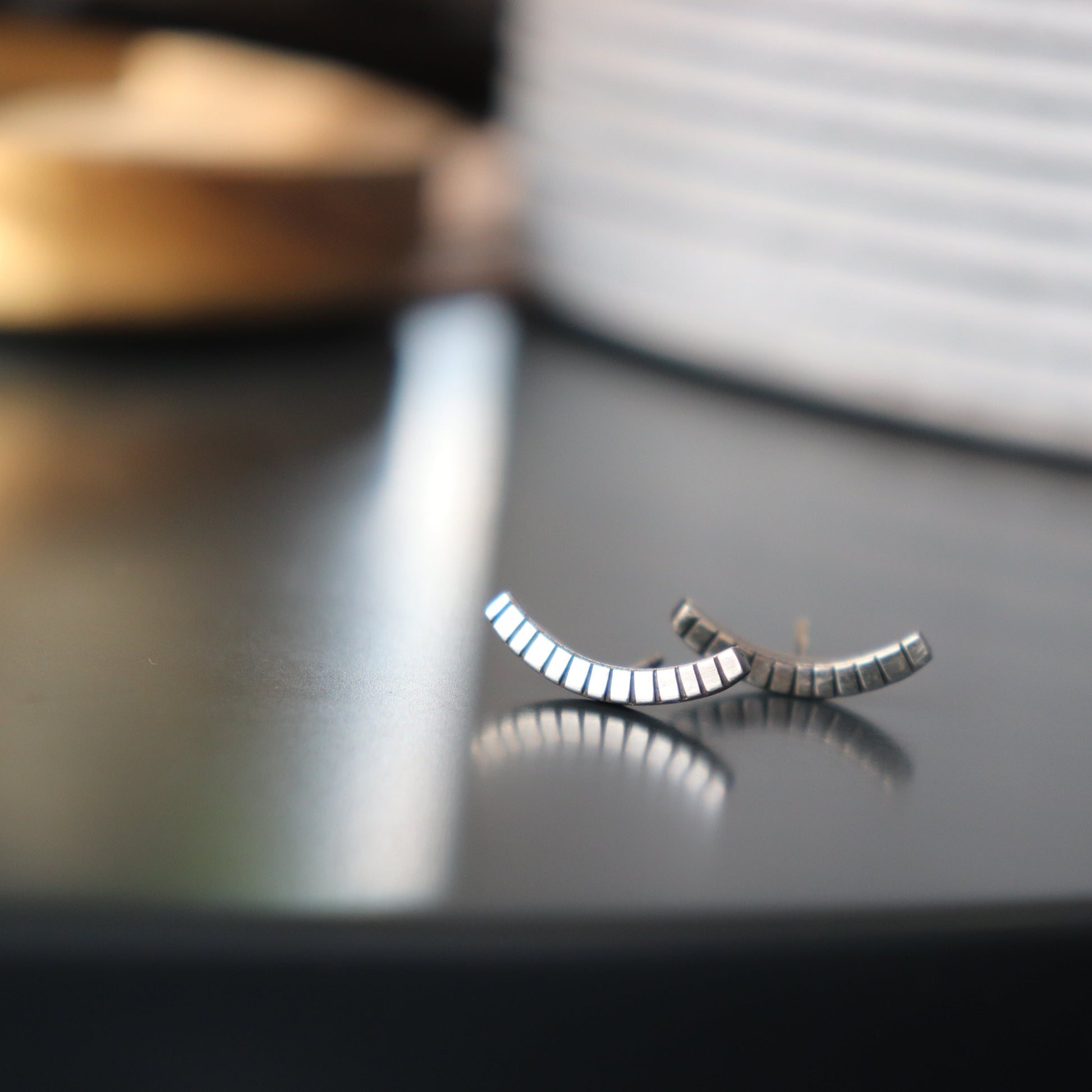Handcrafted minimalist silver stud earrings from the "Nothing, Really" collection. Made from recycled silver with clean lines and a high-shine finish. Ships from Croatia.